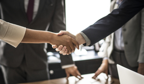 Business People Shaking Hands Meeting Room